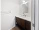 Bathroom featuring a wood vanity with a white countertop, a mirror and updated fixtures at 3951 Haynes Cir, Casselberry, FL 32707