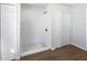 Beautiful bathroom featuring white subway tiles in shower with dark wood vinyl floors at 3951 Haynes Cir, Casselberry, FL 32707