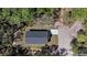 Aerial view of a modern home surrounded by trees at 435 Lincoln Ave, Oviedo, FL 32766