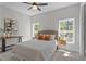 Bright bedroom featuring neutral decor and an abundance of natural light at 435 Lincoln Ave, Oviedo, FL 32766