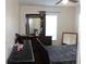 Bedroom featuring ceiling fan, natural lighting and closet access at 4964 Luge Ln, Orlando, FL 32839