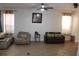 Inviting living room space featuring comfortable couches, and nice window views at 4964 Luge Ln, Orlando, FL 32839