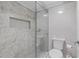 Modern bathroom with a glass-enclosed shower, stylish tile, and built-in niche at 530 E Central Blvd # 705, Orlando, FL 32801