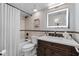 Well-appointed bathroom featuring a combined bathtub and shower, along with vanity and sink at 530 E Central Blvd # 705, Orlando, FL 32801