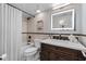 Beautifully updated bathroom with tub, vanity, and contemporary fixtures at 530 E Central Blvd # 705, Orlando, FL 32801