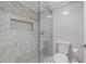 Updated bathroom with a glass shower and stylish tiled walls and floors at 530 E Central Blvd # 705, Orlando, FL 32801