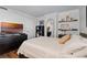 Cozy bedroom featuring a comfortable bed, TV, and stylish decor at 530 E Central Blvd # 705, Orlando, FL 32801