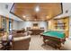 Community game room with pool table, seating, and entertainment options at 530 E Central Blvd # 705, Orlando, FL 32801