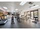 Modern gym with treadmills, elliptical machines, bikes, and free weights with a view at 530 E Central Blvd # 705, Orlando, FL 32801