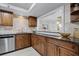 Kitchen area with stainless steel appliances, granite countertops, and ample cabinet space at 530 E Central Blvd # 705, Orlando, FL 32801