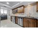 Modern kitchen with stainless steel appliances, granite countertops, and tiled backsplash at 530 E Central Blvd # 705, Orlando, FL 32801