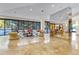 Elegant lobby with ample seating, marble floors, and large windows at 530 E Central Blvd # 705, Orlando, FL 32801