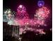 Colorful fireworks over downtown buildings create a dazzling night view at 530 E Central Blvd # 705, Orlando, FL 32801