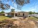 Open backyard featuring a patio area and lawn at 760 Park Ave, Orange City, FL 32763