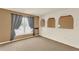 Bedroom with neutral carpet, natural light and decorative wall insets at 9649 Water Fern Cir, Clermont, FL 34711