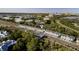 Scenic aerial shot of townhomes situated near a well-connected road with a beautiful view of the cityscape at 10359 Ebb Tide Ln, Orlando, FL 32821