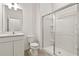 Modern bathroom with glass-enclosed shower and sleek vanity at 10359 Ebb Tide Ln, Orlando, FL 32821