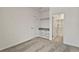 Bedroom featuring carpeted floors, closet with shelving and a doorway to the bathroom at 10359 Ebb Tide Ln, Orlando, FL 32821