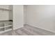 Bedroom featuring carpeted floors, closet with shelving and a doorway to the bathroom at 10359 Ebb Tide Ln, Orlando, FL 32821