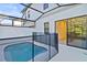 Private backyard pool area with screen enclosure and access to home at 10359 Ebb Tide Ln, Orlando, FL 32821