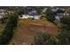 Expansive aerial view of property featuring a screen enclosed pool and large backyard at 1080 Edmiston Pl, Longwood, FL 32779