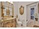 Charming bathroom features unique vanity, and elegant décor at 1080 Edmiston Pl, Longwood, FL 32779