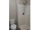 Bathroom featuring a standing shower with white tiling and a modern showerhead at 115 Royalty Cir, Sanford, FL 32771