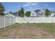 Spacious backyard enclosed by a white privacy fence, offering a secure outdoor space at 120 Lake Dr, Oviedo, FL 32765