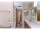 Bathroom features a well-lit vanity and a shower/tub combo at 120 Lake Dr, Oviedo, FL 32765