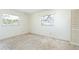 Bedroom featuring neutral walls, carpeted floors and windows to let in light at 120 Lake Dr, Oviedo, FL 32765