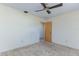 Bedroom features ceiling fan, closet space, and carpeted floors at 120 Lake Dr, Oviedo, FL 32765