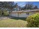 Home's exterior with tidy landscaping, a well-maintained lawn, and a welcoming front entrance at 120 Lake Dr, Oviedo, FL 32765