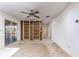 Spacious living room features a ceiling fan and built-in shelving at 120 Lake Dr, Oviedo, FL 32765