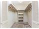 Spacious walk-in closet with ample shelving and hanging space at 120 Lake Dr, Oviedo, FL 32765