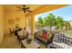 Relaxing outdoor balcony with comfortable seating, perfect for enjoying the community view and fresh air at 1447 Lake George Dr, Lake Mary, FL 32746