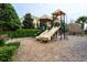 A playground provides a fun outdoor space for with slides and climbing structures at 1447 Lake George Dr, Lake Mary, FL 32746