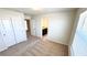 Bedroom featuring neutral carpet with closet and bathroom at 16248 Saint Kitts Cir, Clermont, FL 34714