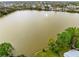 An aerial view of a lake featuring a beautiful water fountain in the middle of the lake at 217 Oak Park Pl, Casselberry, FL 32707