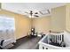 Well-lit bedroom with ceiling fan and ample space for furniture at 217 Oak Park Pl, Casselberry, FL 32707