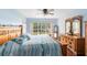 Bright bedroom with large window overlooking green backyard at 217 Oak Park Pl, Casselberry, FL 32707