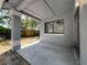 Back porch features a support beam with a view of the backyard at 2253 Atrium Cir, Orlando, FL 32808