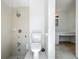 This bathroom features a tub and shower combo, toilet, and separate vanity area at 2253 Atrium Cir, Orlando, FL 32808