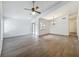 Spacious living room featuring wood-look flooring and ample natural light at 2253 Atrium Cir, Orlando, FL 32808