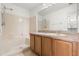 Bathroom featuring a tub/shower combination and vanity with wood cabinets at 237 Rialto Rd, Kissimmee, FL 34759