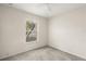 Bedroom with neutral carpet, a window, and light-colored walls at 237 Rialto Rd, Kissimmee, FL 34759