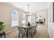 Formal dining room provides seating for six, lots of windows, and is adjacent to the living room at 2480 Northumbria Dr, Sanford, FL 32771