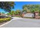 Buckingham Estates gated entrance with brick signage and professional landscaping creating an inviting first impression at 2480 Northumbria Dr, Sanford, FL 32771