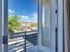 Balcony view of neighborhood featuring green trees, blue sky and house across the street at 321 Pendant Ct, Kissimmee, FL 34747