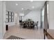 Dining room featuring a table and chairs along with large windows and tiled floors at 321 Pendant Ct, Kissimmee, FL 34747