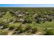 Scenic aerial view of the community on a golf course surrounded by lush green trees at 3960 Villas Green Cir, Longwood, FL 32779